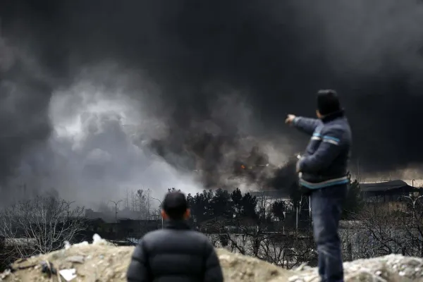 Tehran Rain Turns Black From Bombed Oil Site Smoke