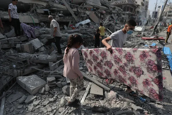 Israel Strikes Gaza City Crowds During Regional Offensive
